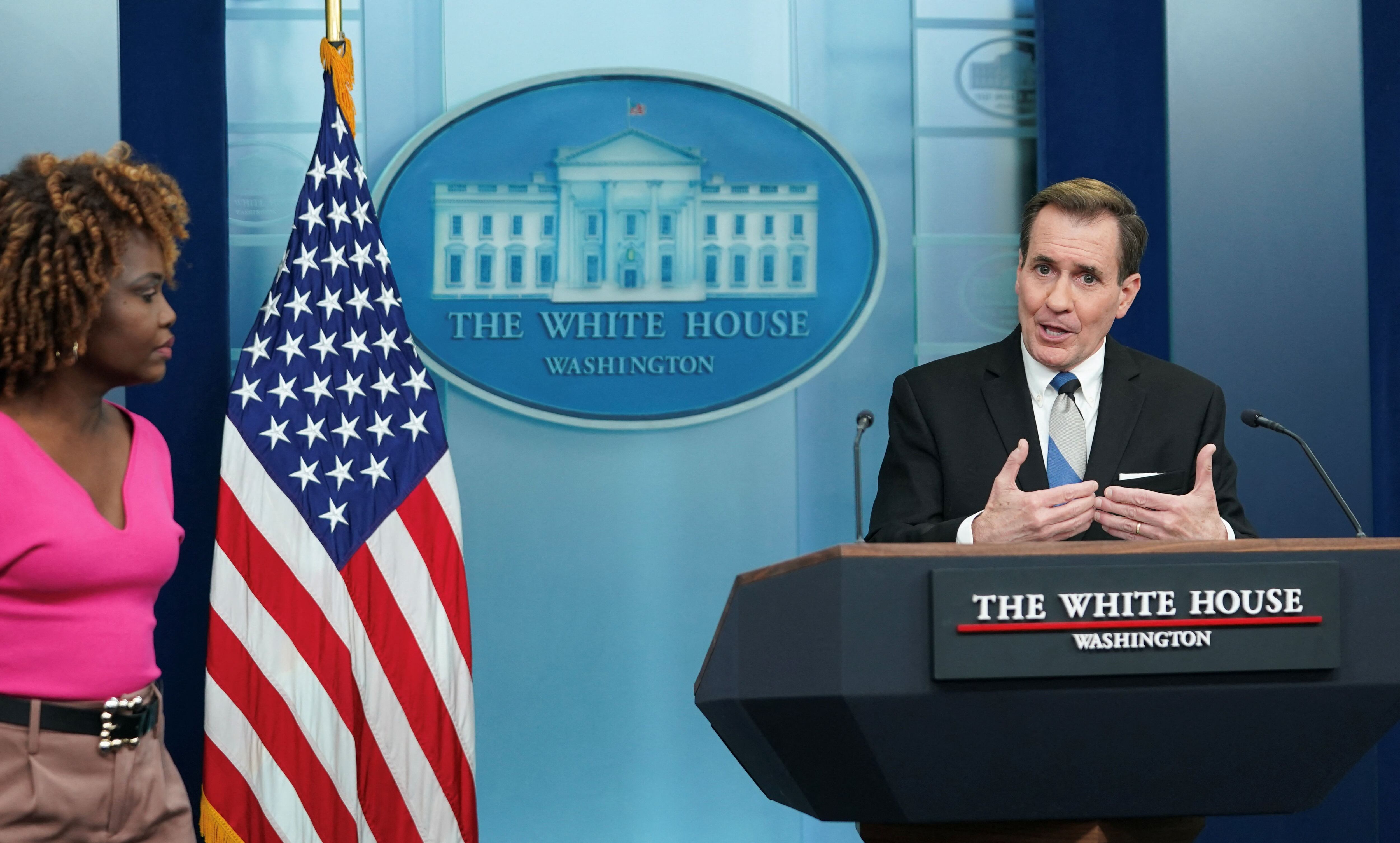 White House press secretary Karine Jean-Pierre listens as White House national security communications adviser John Kirby answers a question during a press briefing at the White House in Washington, U.S., February 15, 2024. REUTERS/Kevin Lamarque