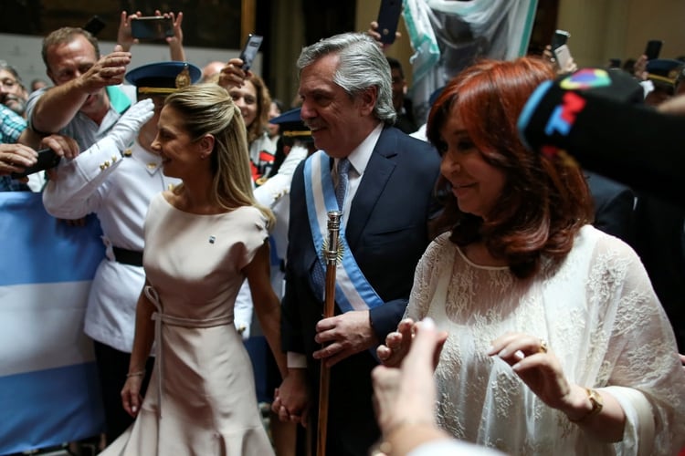 Argentina's President Alberto Fernandez, his partner Fabiola Yanez, and Vice President Cristina Fernandez de Kirchner leave after the inauguration ceremony,in Buenos Aires, Argentina December 10, 2019. REUTERS/Agustin Marcarian