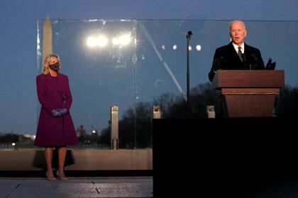 FILE PHOTO: U.S. President-elect Joe Biden delivers remarks at a coronavirus disease (COVID-19) memorial event at the Lincoln Memorial in Washington, U.S. January 19, 2021. REUTERS/Tom Brenner/File Photo
