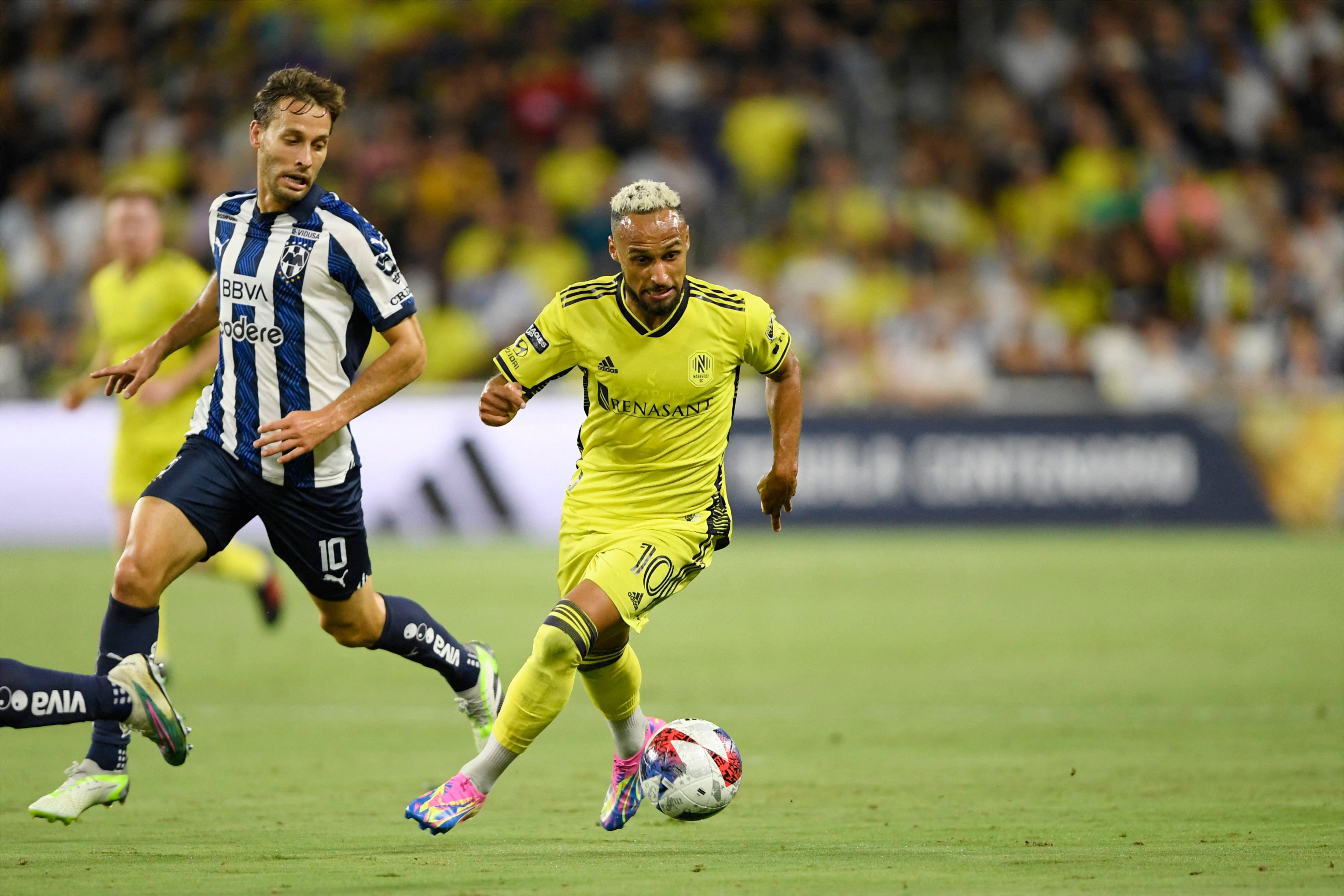 Aug 15, 2023; Nashville, TN, USA; Nashville SC midfielder Hany Mukhtar (10) plays the ball defended by CF Monterrey midfielder Sergio Canales (10) in the first half at GEODIS Park. Mandatory Credit: Steve Roberts-USA TODAY Sports