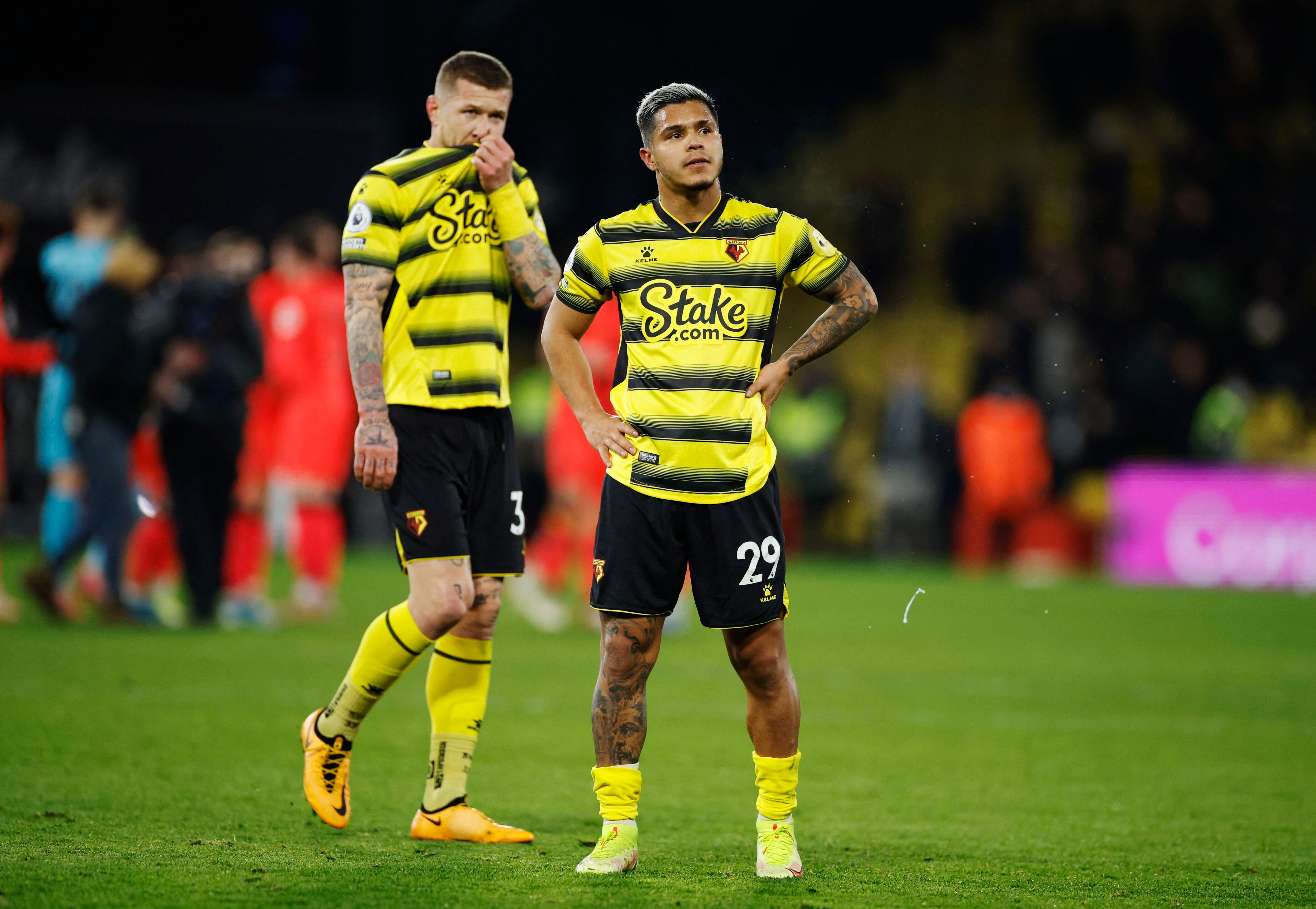 Soccer Football - Premier League - Watford v Norwich City - Vicarage Road, Watford, Britain - January 21, 2022  Watford's Cucho Hernandez and Juraj Kucka look dejected after the match Action Images via Reuters/John Sibley EDITORIAL USE ONLY. No use with unauthorized audio, video, data, fixture lists, club/league logos or 'live' services. Online in-match use limited to 75 images, no video emulation. No use in betting, games or single club /league/player publications.  Please contact your account representative for further details.