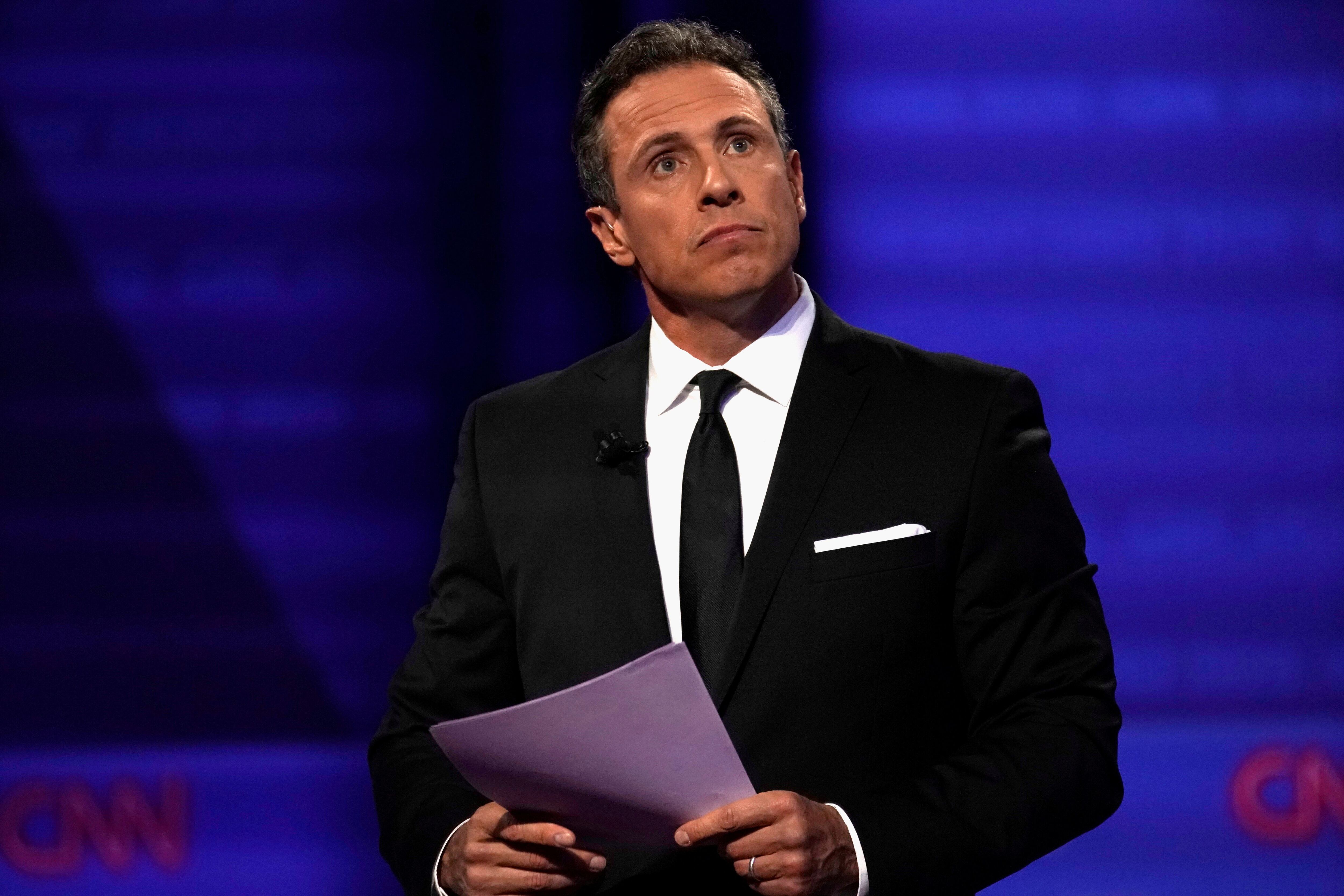 CNN fired host Chris Cuomo for interfering on behalf of his brother, the former New York governor, in a sex scandal (Reuters)