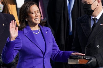 Kamala Harris is sworn in as U.S. Vice President as her spouse Doug Emhoff holds a bible during the inauguration of Joe Biden as the 46th President of the United States on the West Front of the U.S. Capitol in Washington, U.S., January 20, 2021. REUTERS/Kevin Lamarque
