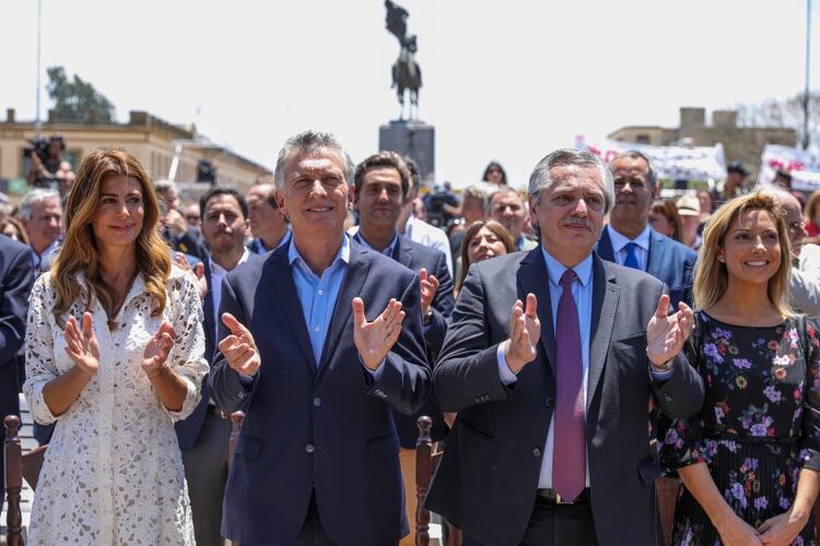 Alberto Fernández y Mauricio Macri este domingo, en la misa de Luján (REUTERS)