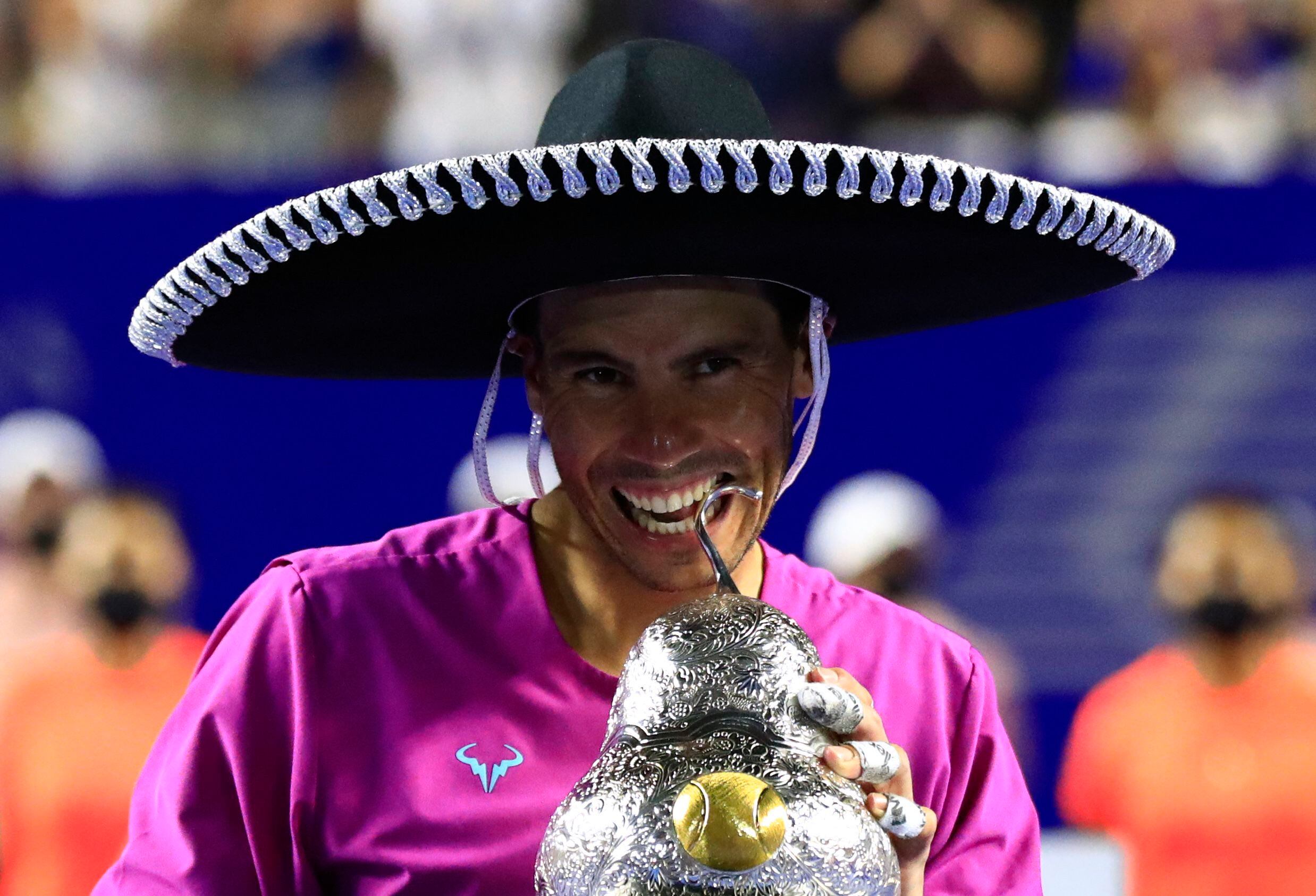 Tennis - ATP 500 - Abierto Mexicano - The Fairmont Acapulco Princess, Acapulco, Mexico - February 26, 2022 Spain's Rafael Nadal celebrates with the trophy after winning the final REUTERS/Henry Romero