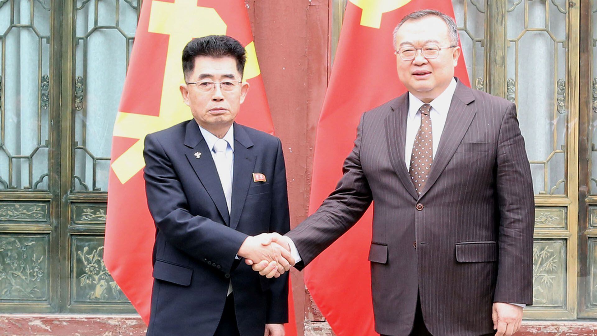 North Korea's Kim Song Nam and Liu Jianchao, who leads the Chinese Communist Party's body in charge of managing ties with foreign political parties meet in Beijing
