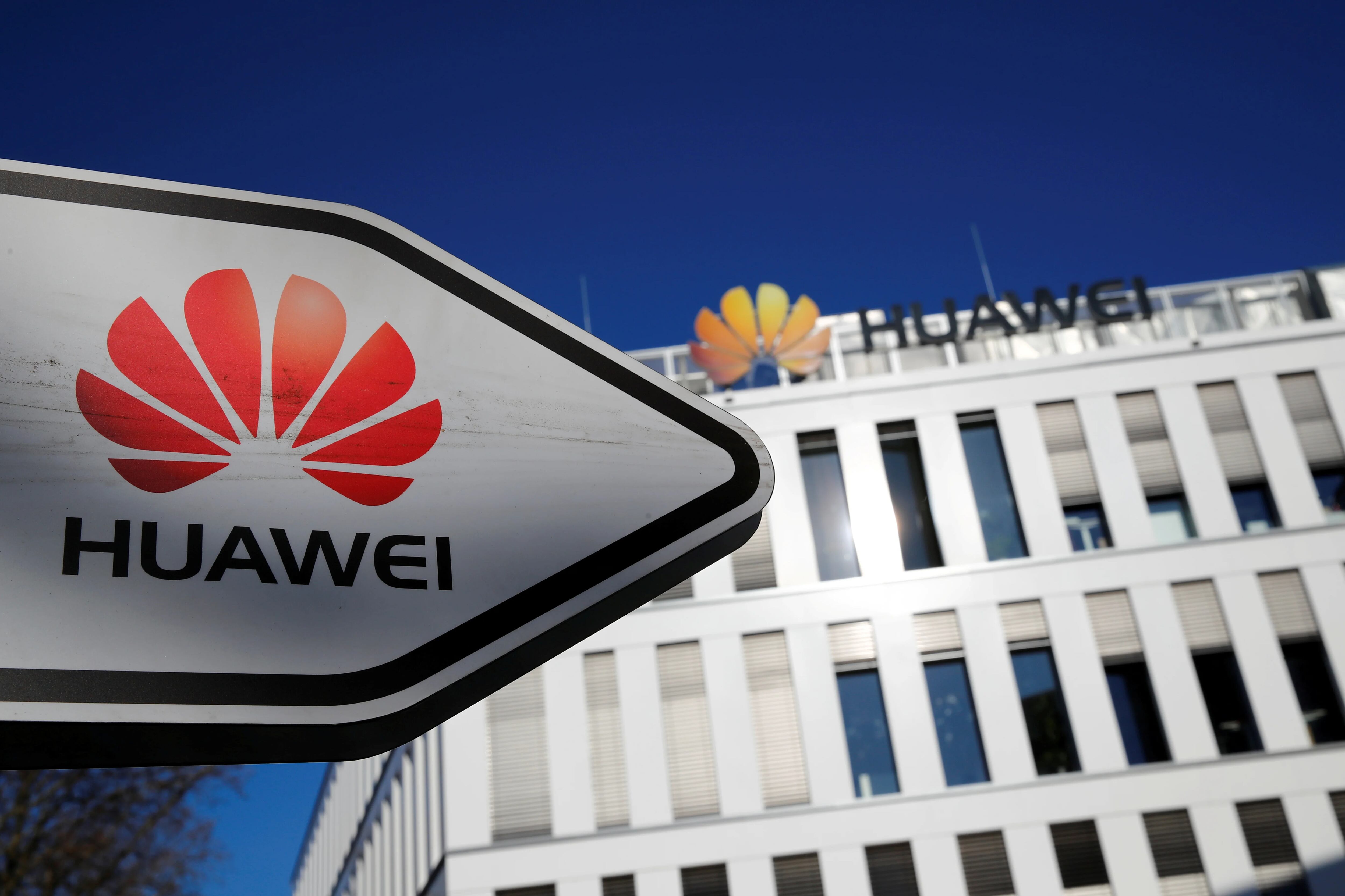 FILE PHOTO: The logo of Huawei Technologies is pictured in front of the German headquarters of the Chinese telecommunications giant in Duesseldorf, Germany, February 18, 2019.    REUTERS/Wolfgang Rattay/File Photo