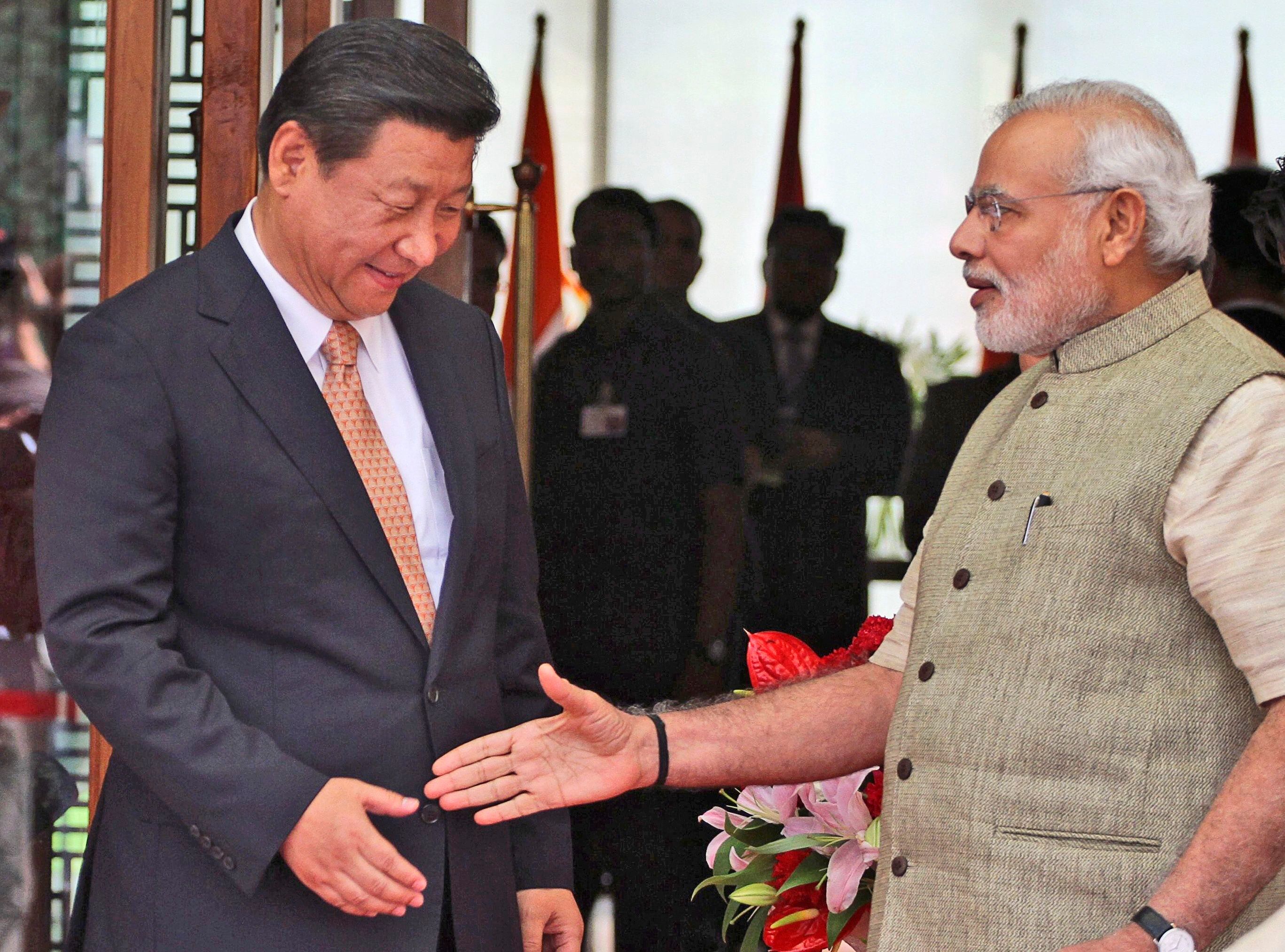 Xi Jinping y Narendra Modi (AP)