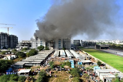 Smoke billows after a fire broke out inside the complex of the Serum Institute of India, in Pune, India, January 21, 2021. REUTERS/Stringer NO RESALES. NO ARCHIVES