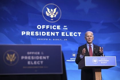 WILMINGTON, DELAWARE - JANUARY 08: U.S. President-elect Joe Biden delivers remarks after he announced cabinet nominees that will round out his economic team, including secretaries of commerce and labor, at The Queen theater on January 08, 2021 in Wilmington, Delaware. Biden announced he is nominating Rhode Island Gov. Gina Raimondo as his commerce secretary, Boston Mayor Martin J. Walsh his labor secretary and Isabel Guzman, a former Obama administration official, as head of the Small Business Administration. (Photo by Chip Somodevilla/Getty Images)