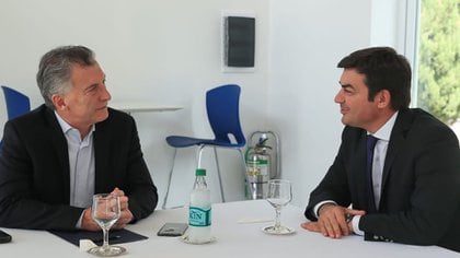 Omar de Marchi reunido con Marucio Macri 