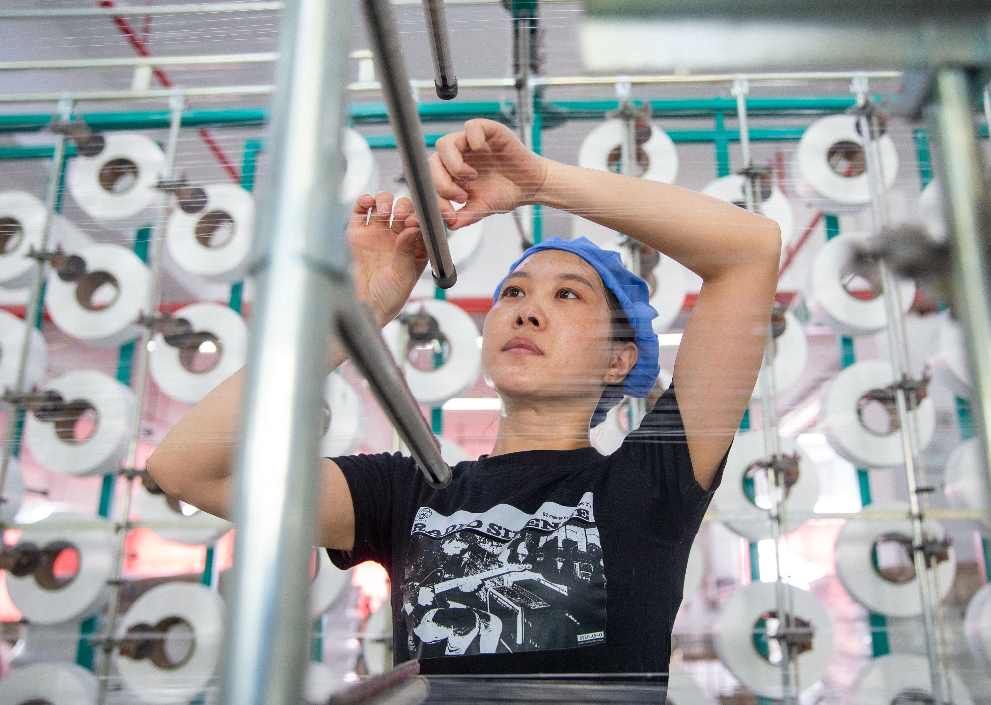 Fábrica textil en la provincia de Jiangsu (AFP)