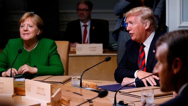 Trump y Merkel durante la cumbre del G7