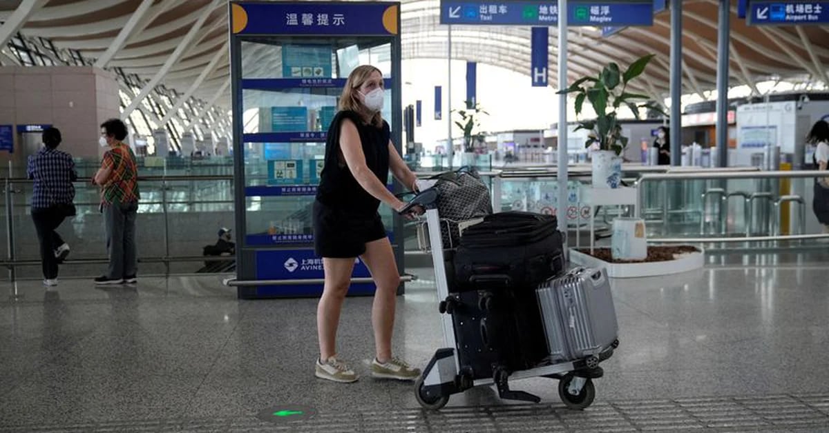 China to reopen borders to foreigners, but with short-term hurdles