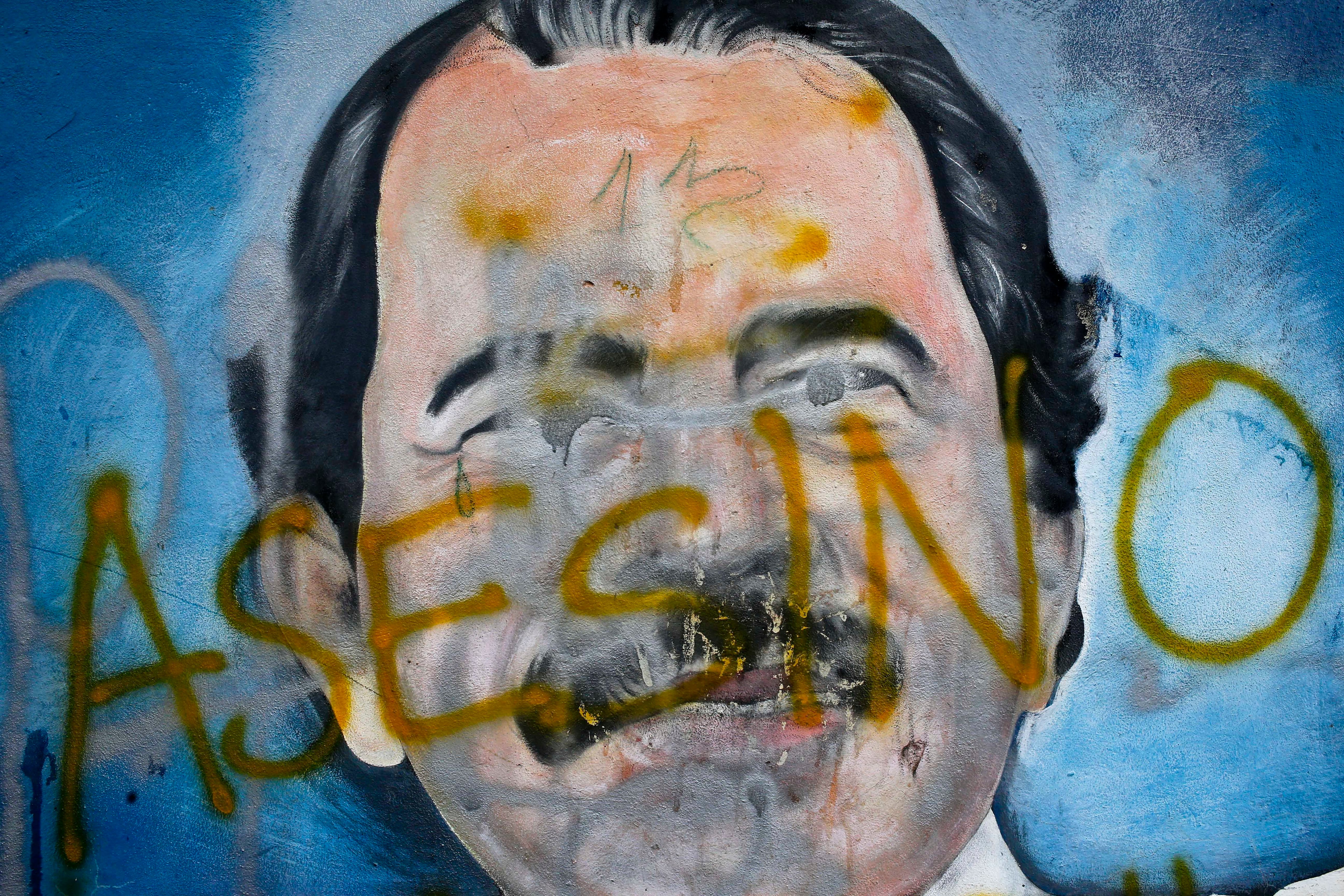 ARCHIVO - Un mural de Daniel Ortega (AP Foto/Esteban Félix, Archivo)