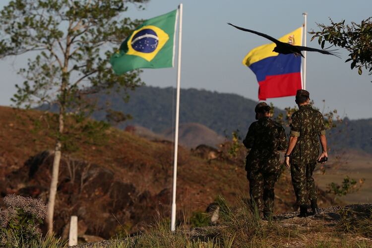 Brazilian army soldiers are seen at the border with Venezuela, seen in Pacaraima, Brazil February 25, 2019. REUTERS/Bruno Kelly