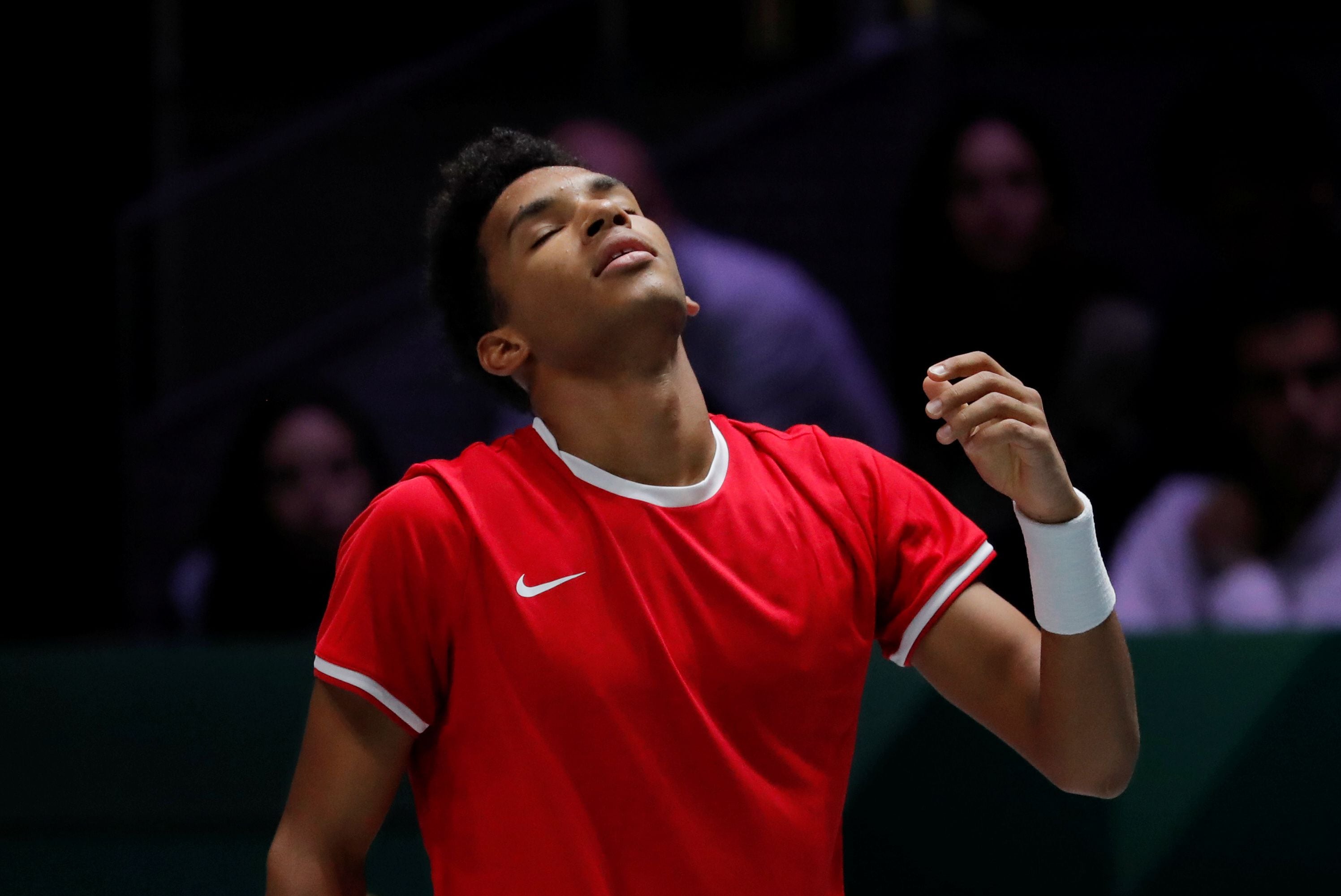 Tennis - Davis Cup Finals - Final - Caja Magica, Madrid, Spain - November 24, 2019   Canada's Felix Auger-Aliassime reacts during his match against Spain's Roberto Bautista Agut   REUTERS/Susana Vera