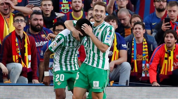 Soccer Football – La Liga Santander – FC Barcelona v Real Betis – Camp Nou, Barcelona, Spain – November 11, 2018 Real Betis’ Junior Firpo celebrates scoring their first goal with team mates REUTERS/Albert Gea