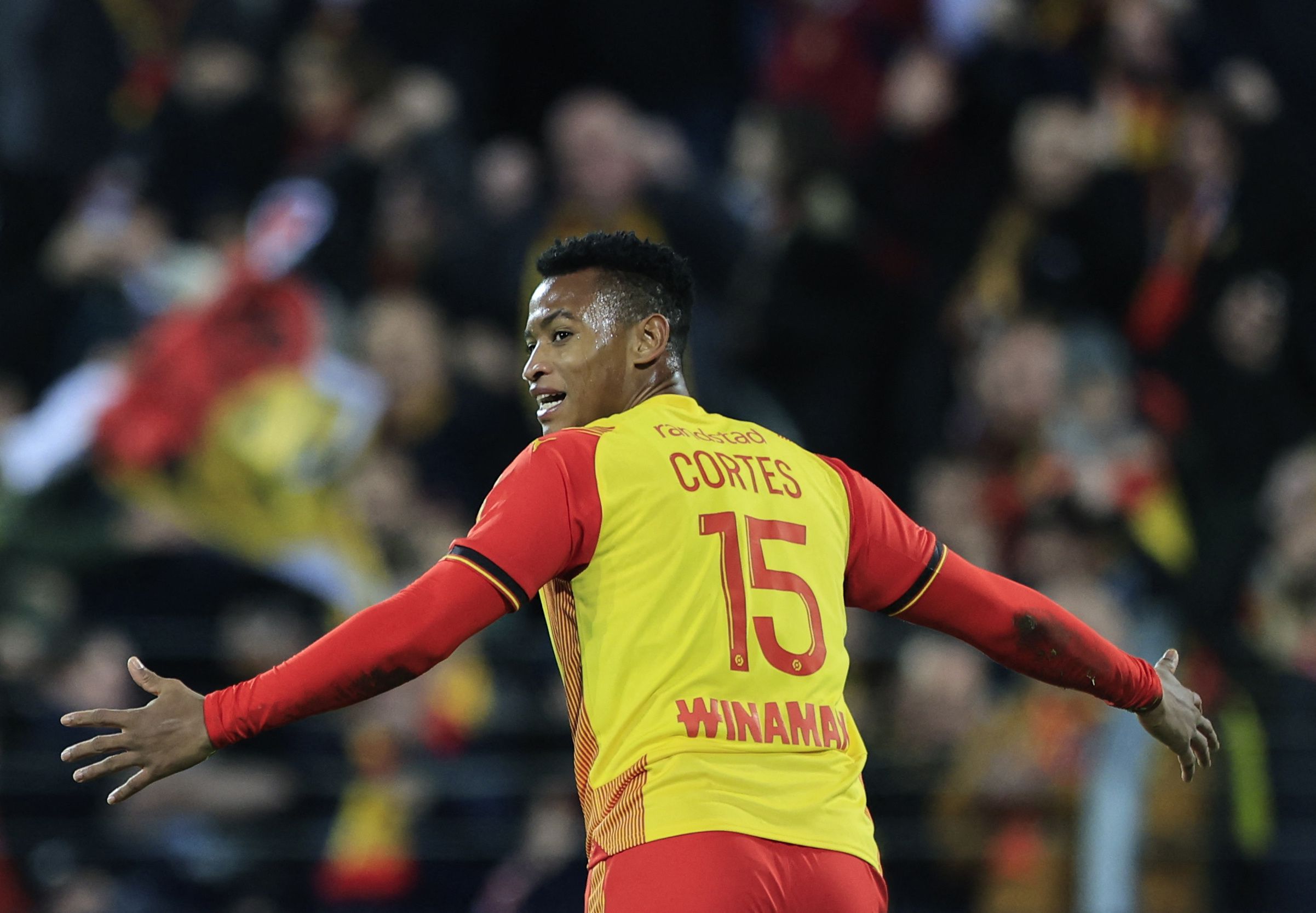 Soccer Football - Ligue 1 - RC Lens v Stade de Reims - Stade Bollaert-Delelis, Lens, France - December 16, 2023 RC Lens' Oscar Cortes celebrates scoring their first goal REUTERS/Pascal Rossignol