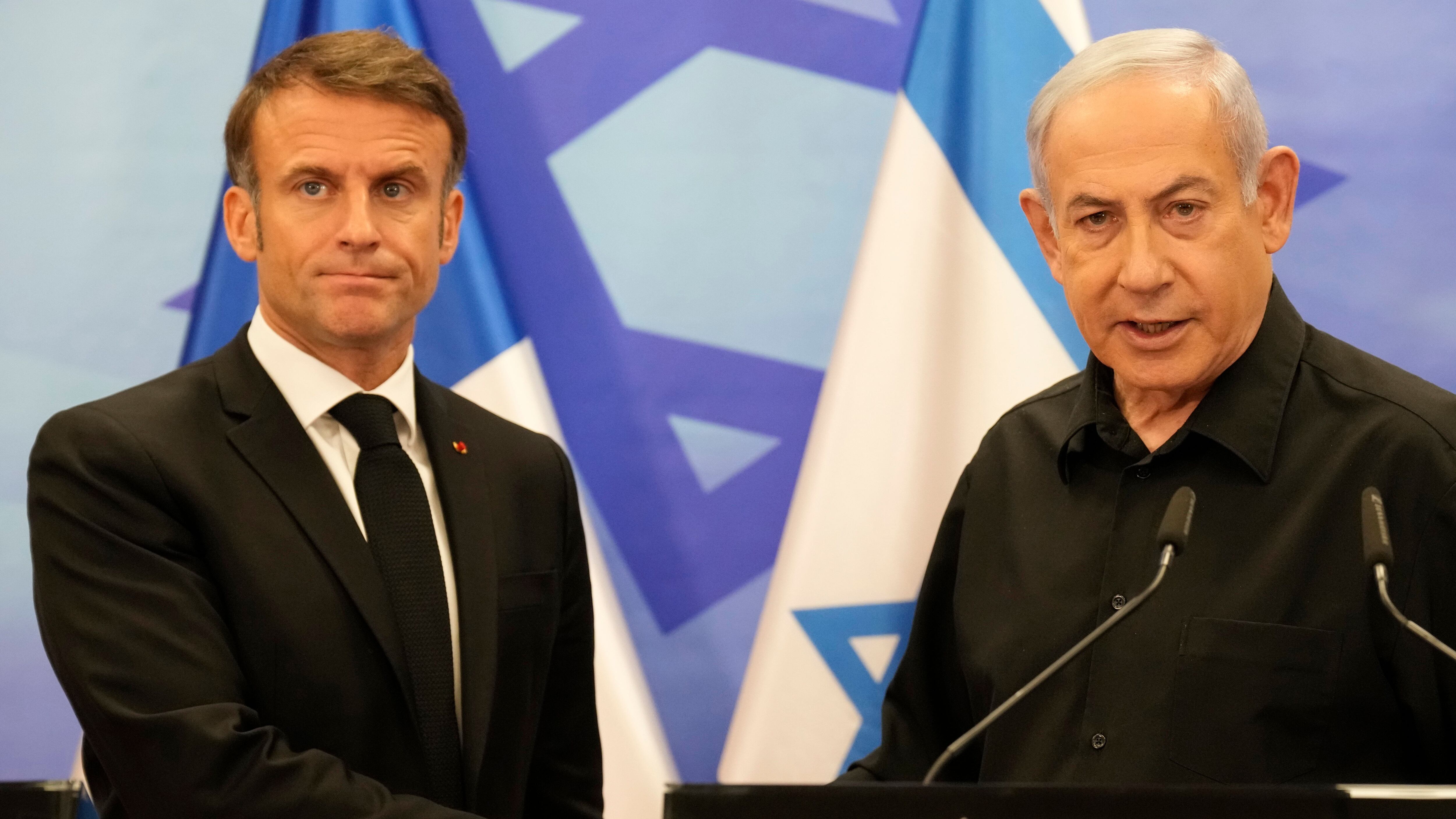 El presidente francés, Emmanuel Macron, y el primer ministro israelí, Benjamin Netanyahu. EFE/EPA/CHRISTOPHE ENA / POOL MAXPPP OUT