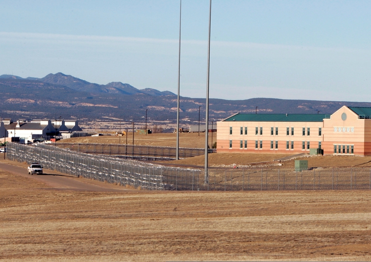 FILE PHOTO: A patrol vehicle is seen along the fencing at the Federal Correctional Complex, including the Administrative Maximum Penitentiary or 