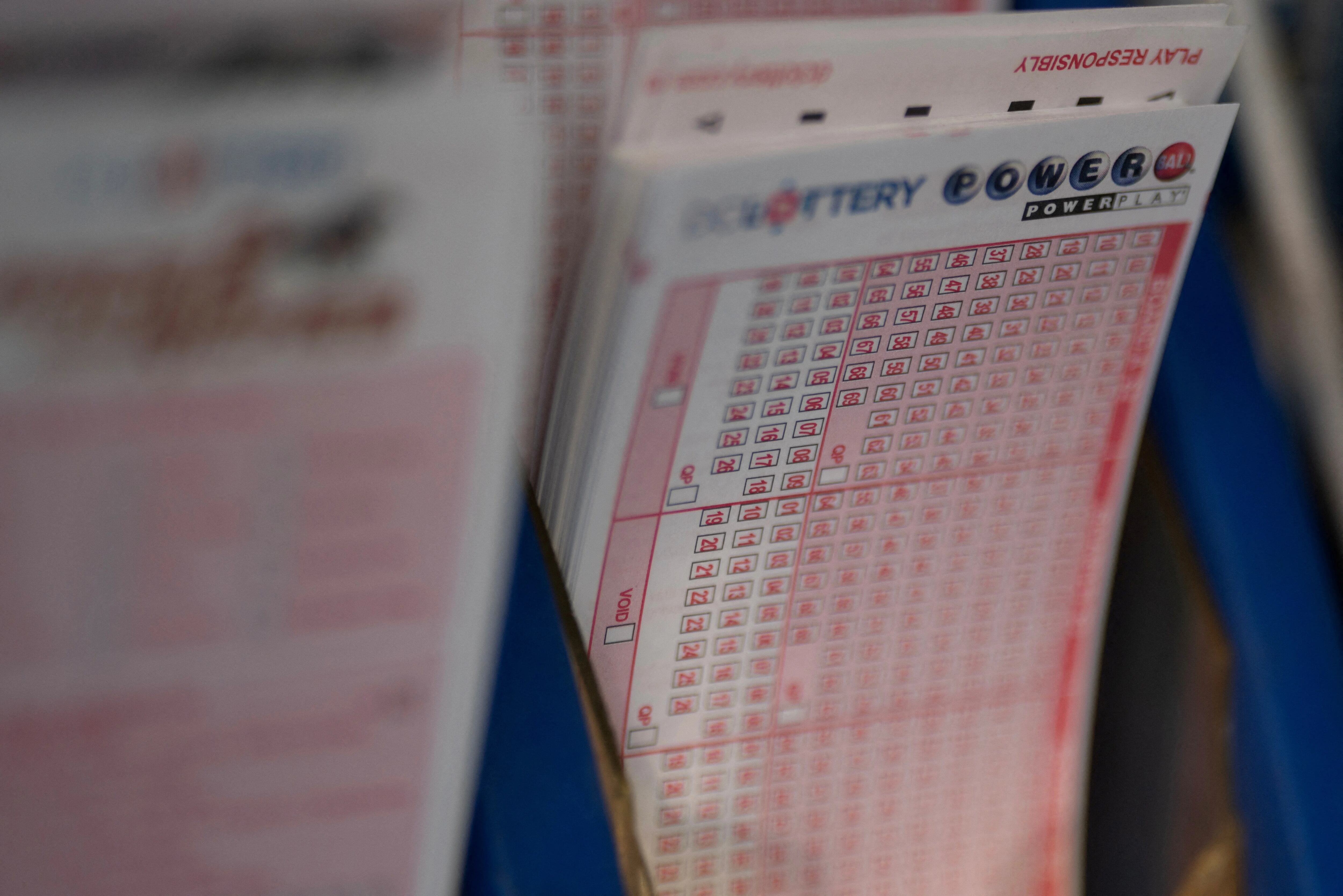 FILE PHOTO: Powerball tickets are seen at a liquor store, in Washington, US, July 19, 2023. REUTERS/Nathan Howard/File Photo