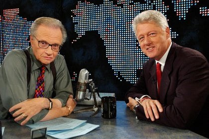 Con Bill Clinton, ya ex presidente, el 3 de septiembre de 2002