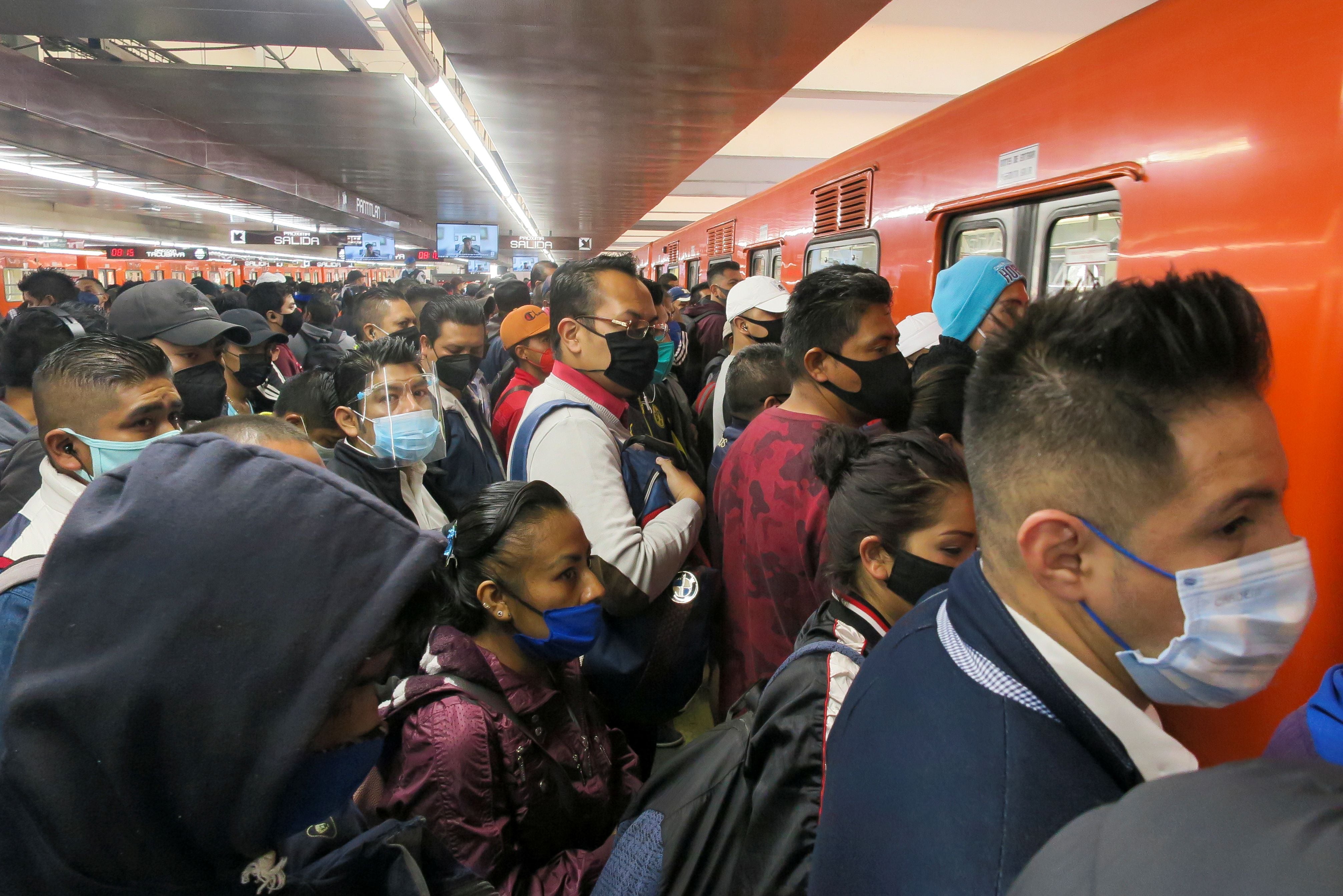 People wait at a platform to enter a metro carriage at the Pantitlan metro station in Mexico City, Mexico May 5, 2021. REUTERS/Luis Cortes