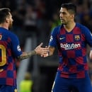 Barcelona's Uruguayan forward Luis Suarez (R) is congratulated by teammate Barcelona's Argentine forward Lionel Messi after scoring a goal during the UEFA Champions League Group F football match between Barcelona and Inter Milan at the Camp Nou stadium in Barcelona, on October 2, 2019. (Photo by LLUIS GENE / AFP)