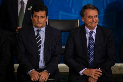 El ex ministro de Justicia Sergio Moro y el presidente de Brasil, Jair Bolsonaro (O GLOBO / ZUMA PRESS)
