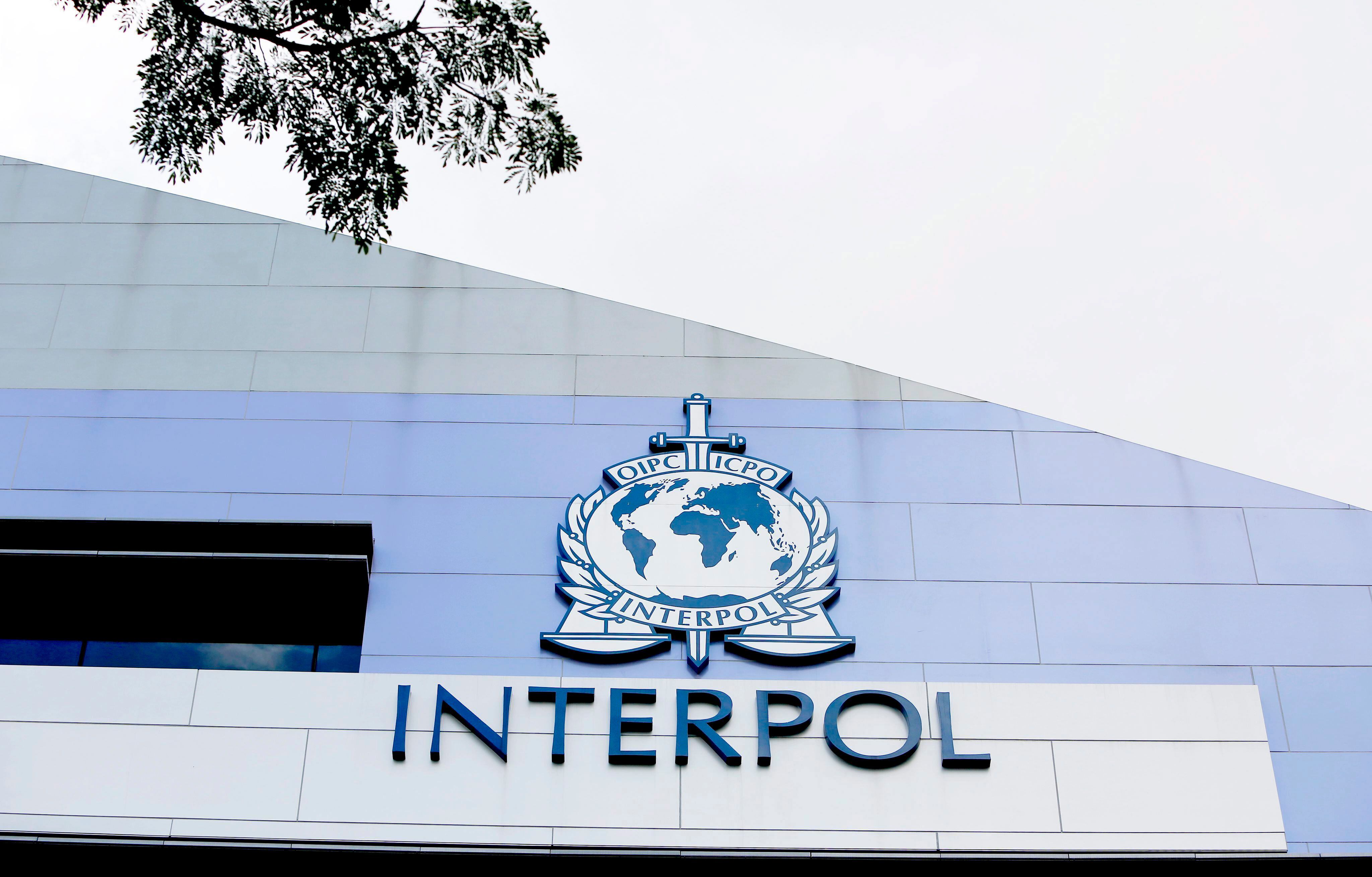 Interpol logo archive image.  EPA / WALLACE WOON
