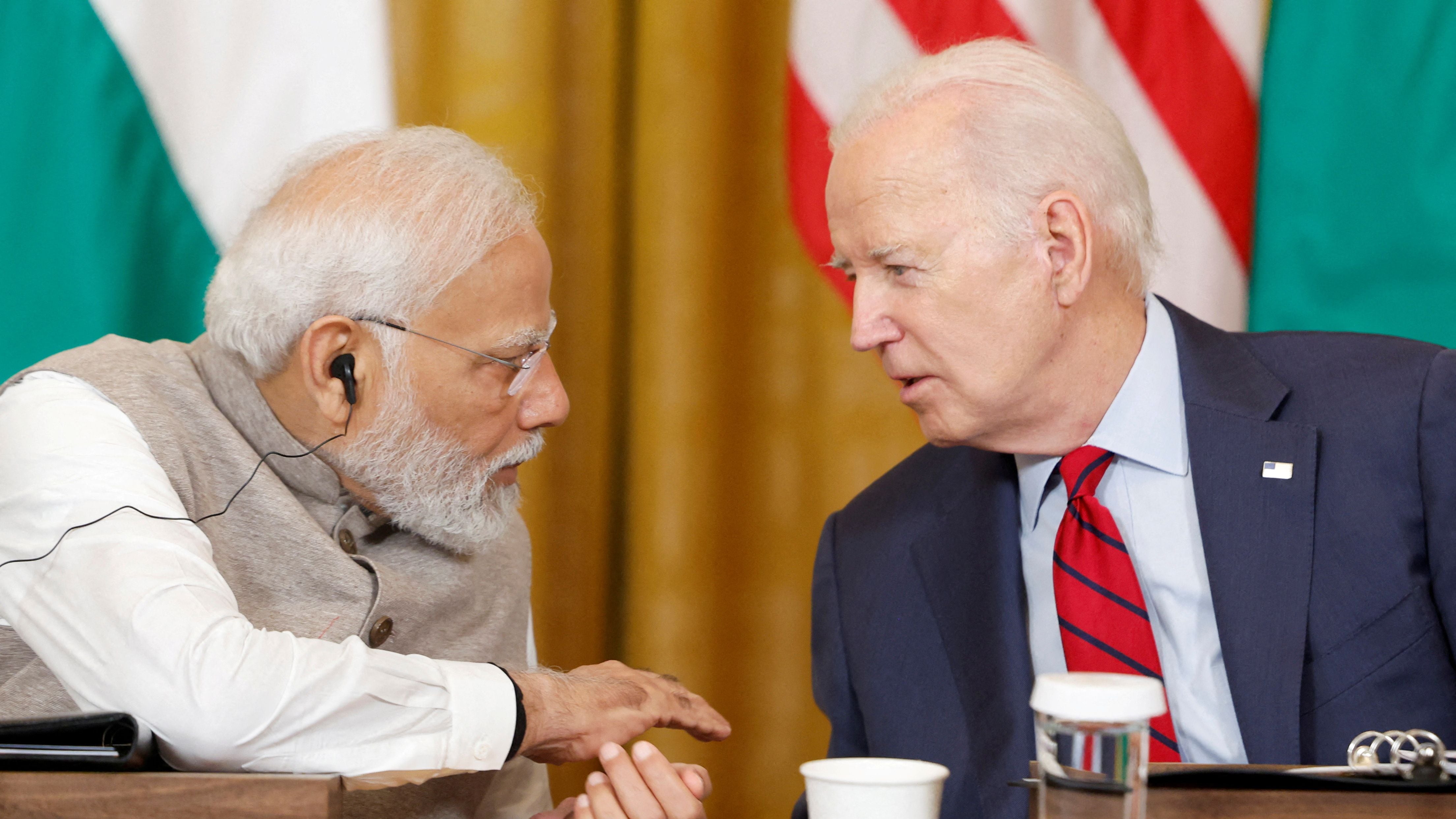 FILE PHOTO: U.S. President Joe Biden and India's Prime Minister Narendra Modi talk during a meeting with senior officials and CEOs of American and Indian companies in the East Room of the White House in Washington, U.S., June 23, 2023. REUTERS/Evelyn Hockstein/File Photo