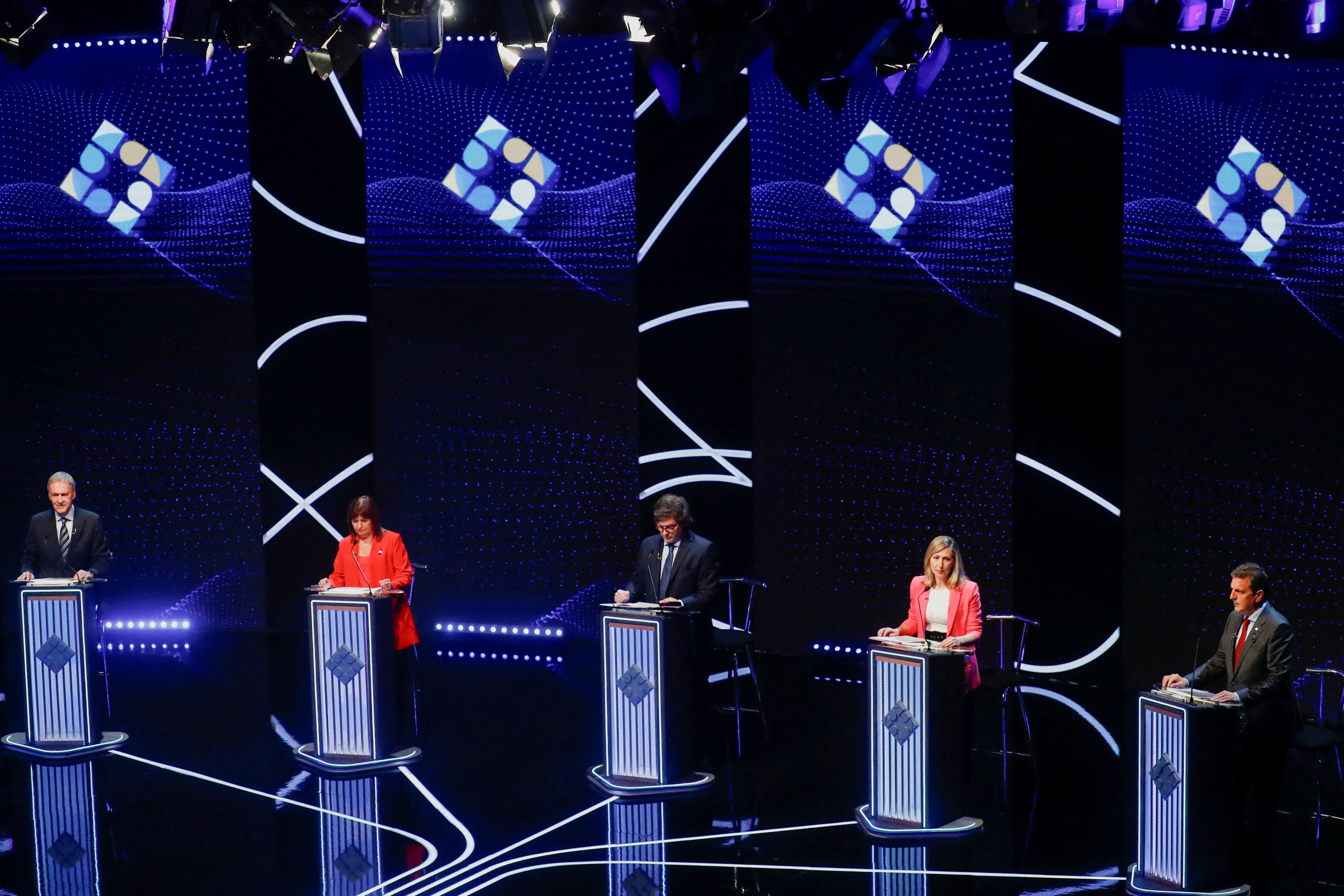 Argentine presidential candidates Myriam Bregman, Sergio Massa, Patricia Bullrich, Juan Schiaretti, and Javier Milei attend the presidential debate ahead of the October 22 general elections, at the University of Buenos Aires' Law School, Argentina October 8, 2023. REUTERS/Agustin Marcarian/Pool