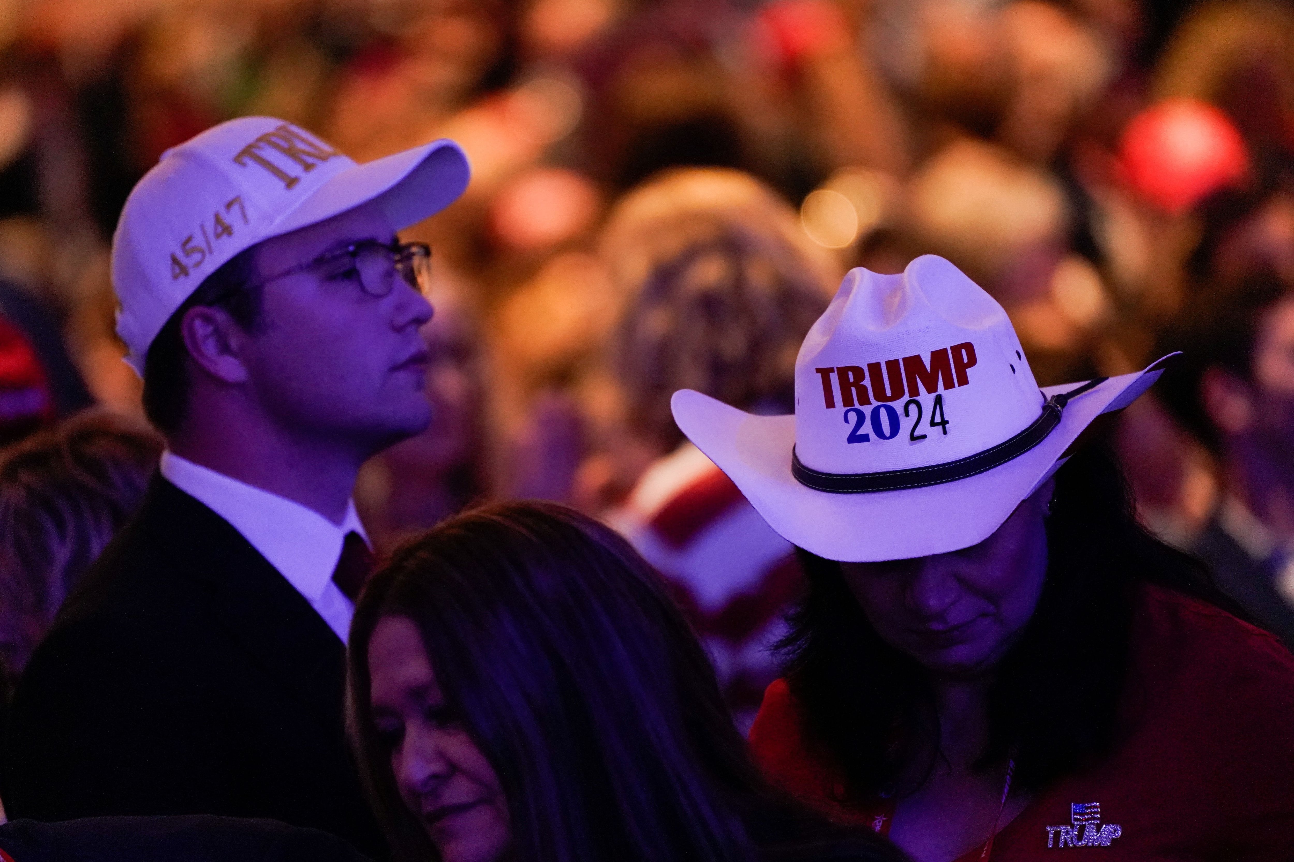 Supporters of former U.S. President and Republican presidential candidate Donald Trump attend the Conservative Political Action Conference (CPAC) annual meeting in National Harbor, Maryland, U.S., February 24, 2024. REUTERS/Elizabeth Frantz