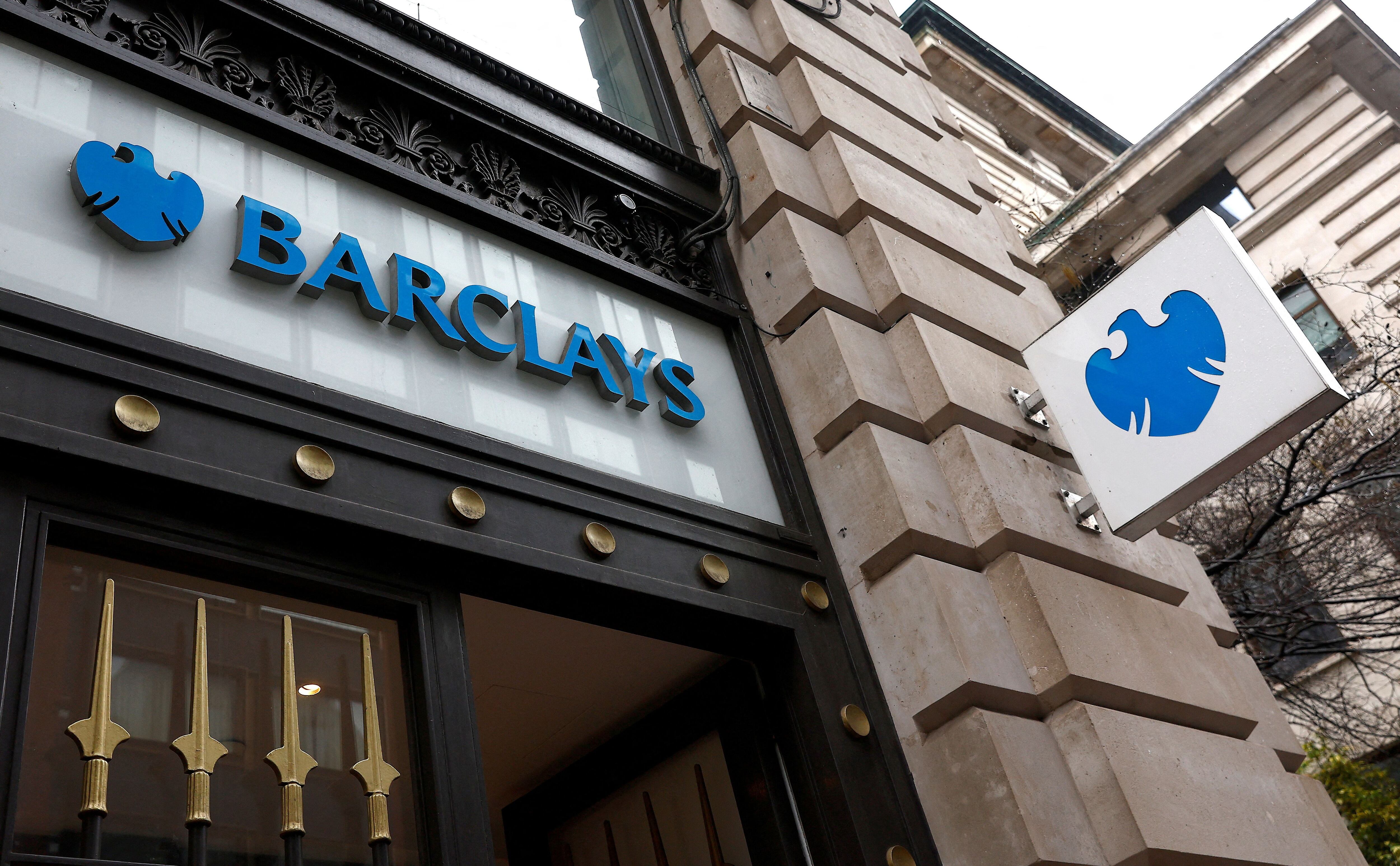 FILE PHOTO: A view shows signage on a branch of Barclays Bank in London, Britain, March 17, 2023.  REUTERS/Peter Nicholls/File Photo