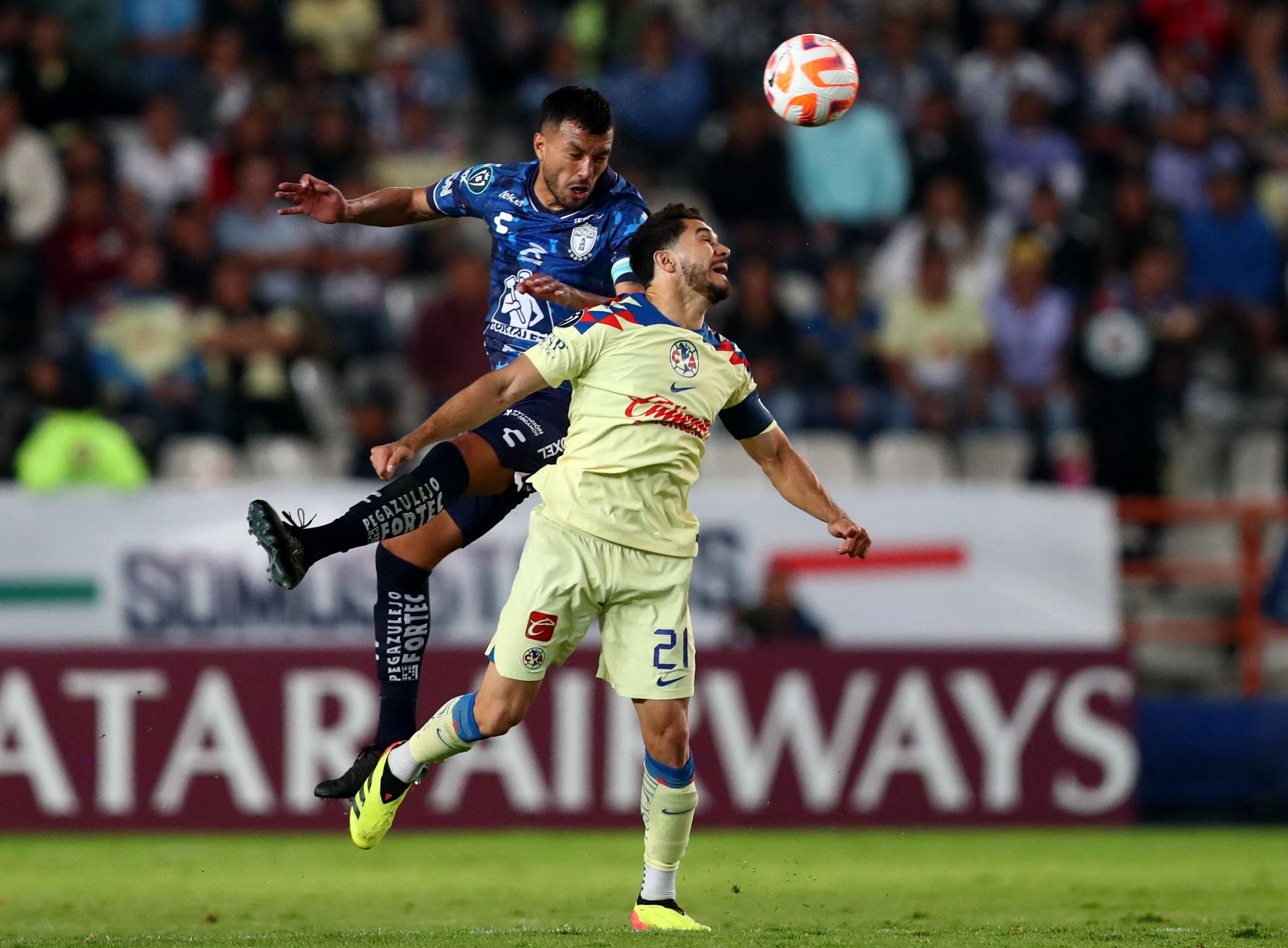 Soccer Football - CONCACAF Champions Cup - Semi-Final - Second Leg - Pachuca v America - Estadio Hidalgo, Pachuca, Mexico - April 30, 2024 Pachuca's Gustavo Cabral in action with America's Henry Martin REUTERS/Raquel Cunha