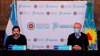 El jefe de Gabinete, Carlos Bianco, y el ministro de Salud, Daniel Gollan