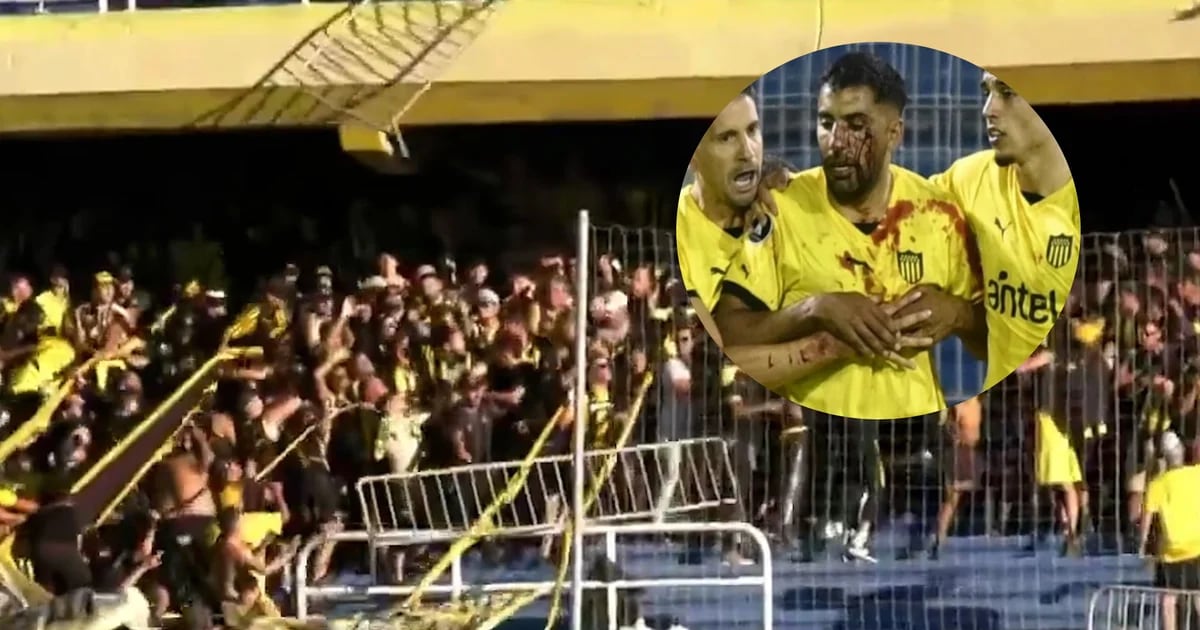 Videos de graves incidentes en Rosario Central-Peñarol: Brutal ataque a jugador uruguayo cuando abandona la cancha en una ambulancia