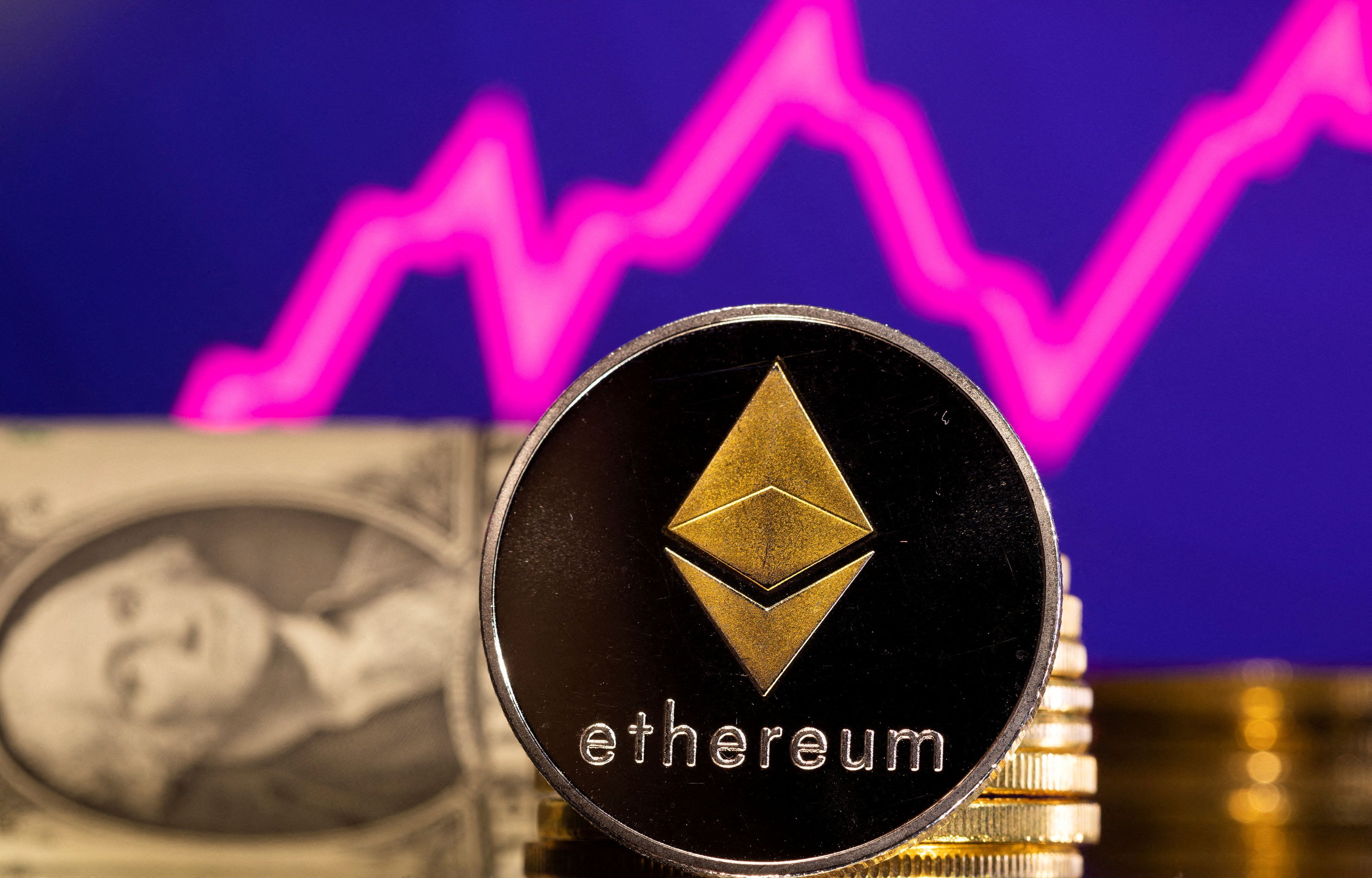 FILE PHOTO: A representations of cryptocurrency Ethereum is seen in front of a stock graph and U.S. dollar in this illustration taken, January 24, 2022. REUTERS/Dado Ruvic/File Photo