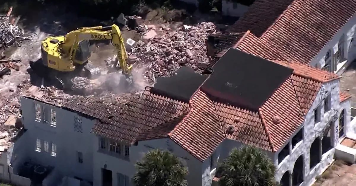 They began demolishing a mansion linked to bin Laden in Florida