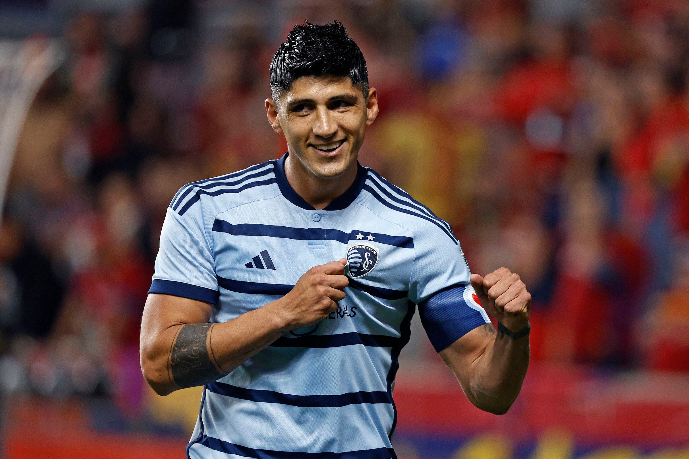 Oct 7, 2023; Sandy, Utah, USA; Sporting Kansas City forward Alan Pulido (9) celebrates after his goal in the second half at America First Field. Mandatory Credit: Jeff Swinger-USA TODAY Sports