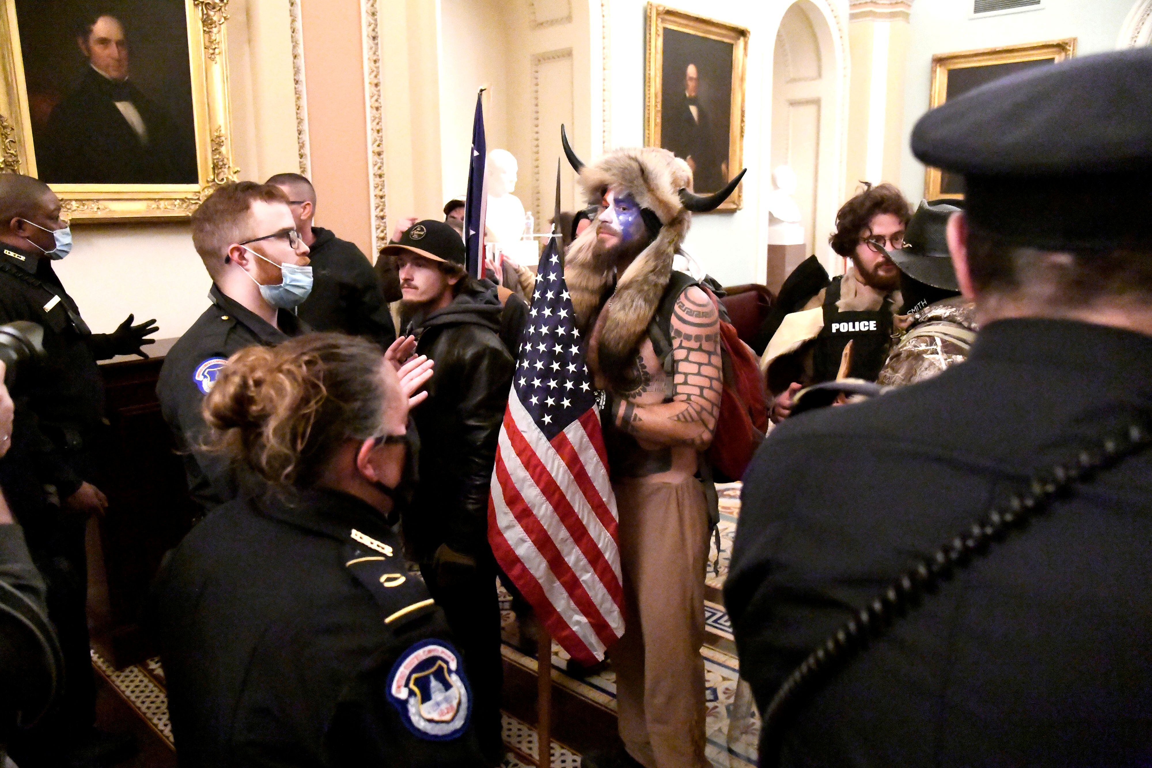 File photo: Police confront supporters of President Donald Trump on the second floor of the United States Capitol, near the entrance to the Senate, on January 6, 2021 (REUTERS / Mike Theiler)