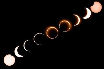 En esta imagen se ve a la luna mientras se mueve frente al sol en el último eclipse de sol de "anillo de fuego" visto desde Tanjung Piai en Malasia el 26 de diciembre de 2019. (Foto de Sadiq ASYRAF / AFP)