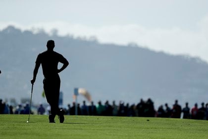 Tiger Woods rompió prejuicios y cambió el golf para siempre. Fue el primer negro en triunfar en el torneo de Augusta. (AP Photo/Gregory Bull)