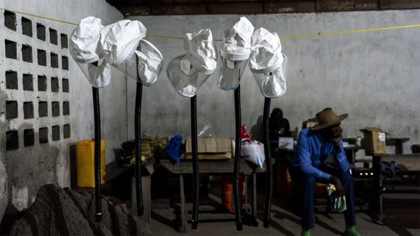 Protective gear for a makeshift lab in Manfouete. There, the scientists catalogue what they caught in traps. Even though the biologists received the smallpox vaccine, it is only 85 percent effective against monkeypox (Washington Post)