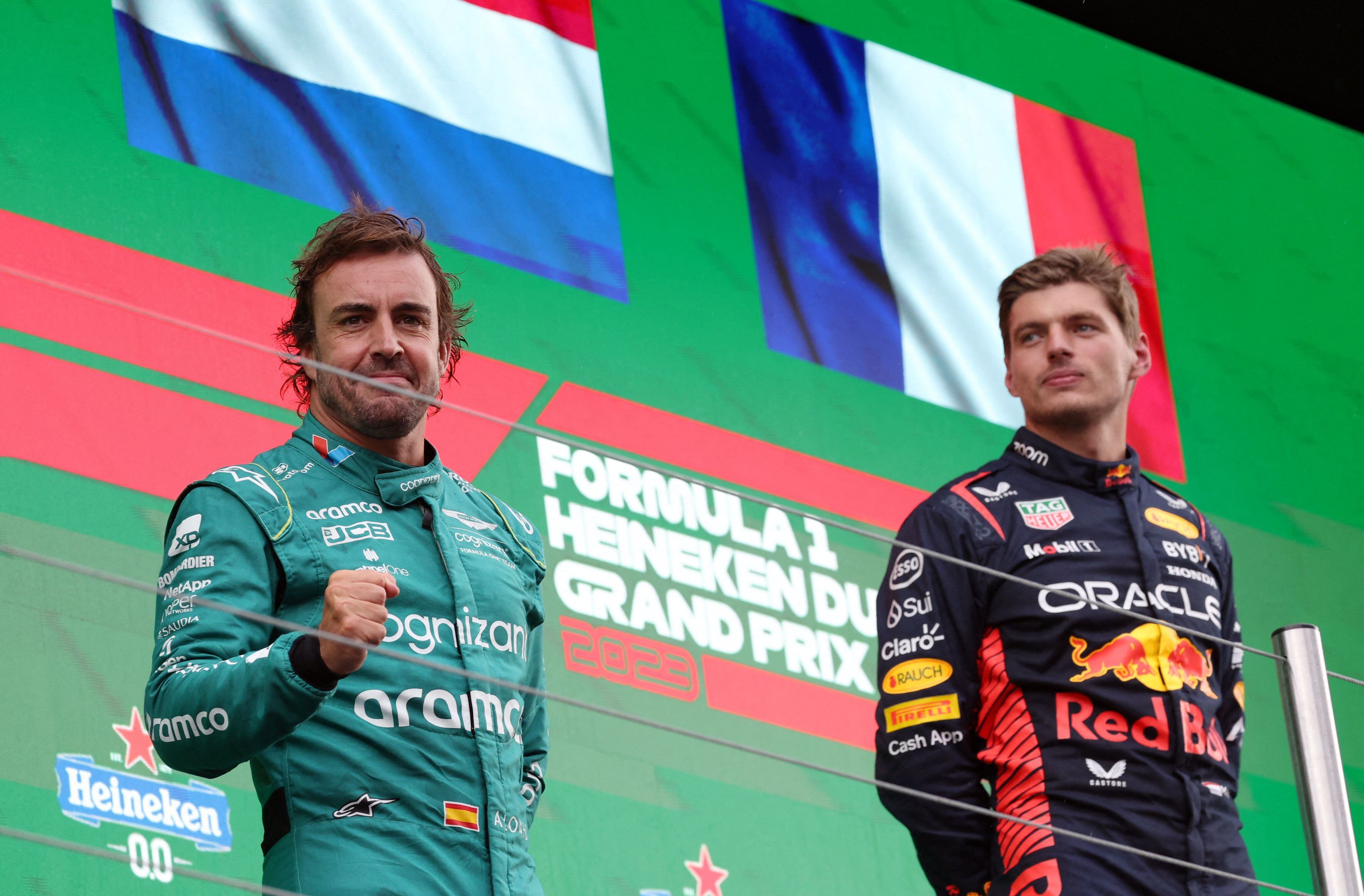 Alonso y Verstappen en el podio del GP de Países Bajos (REUTERS).