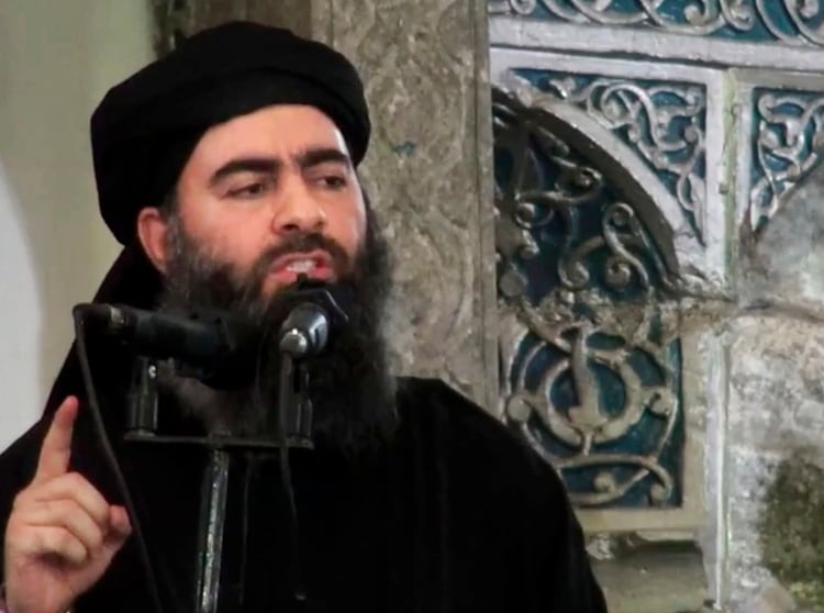 Abu Bakr al-Baghdad. (AP Photo/Militant video, File)