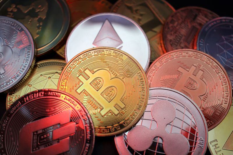 Representations of cryptocurrencies including Bitcoin, Dash, Ethereum, Ripple and Litecoin are seen in this illustration picture taken June 2, 2021. REUTERS/Florence Lo/Illustration