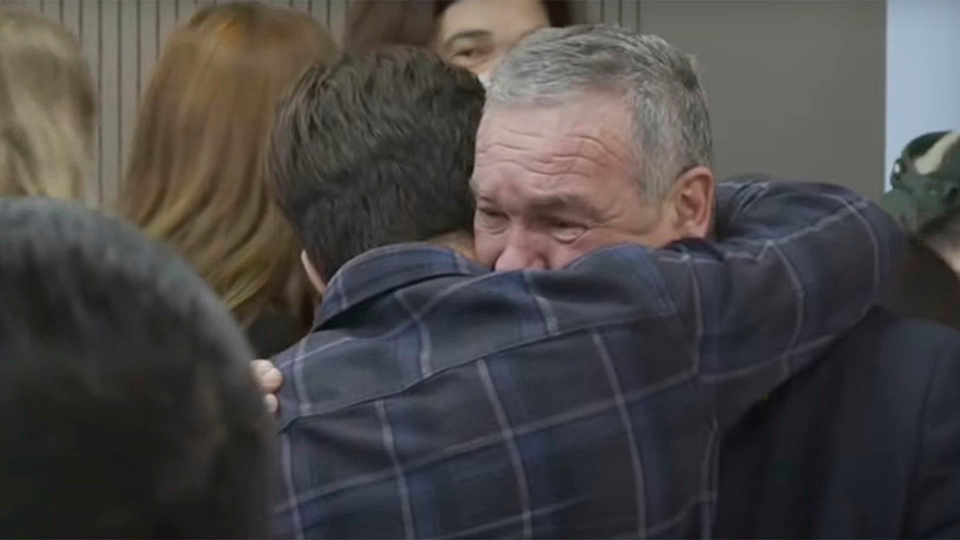 Macarrón hugs his son after being acquitted