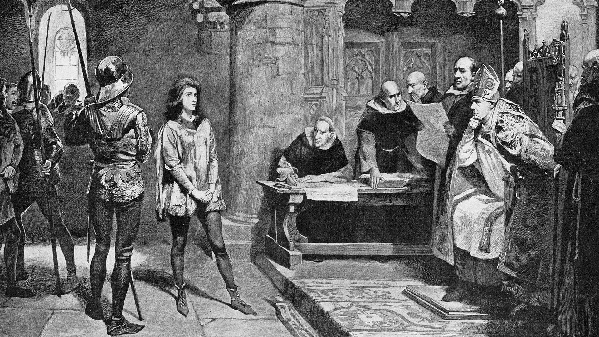 El juicio a Juana de Arco, pintado por Frederick Rae. La condenaron a morir acusada de setenta cargos: herejía, idolatría, apostasía, abandono del hogar y travestismo, entre tantos otros